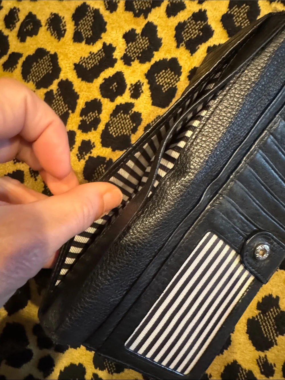 kate spade Black Pebbled Leather Continental Wallet with Gold Logo